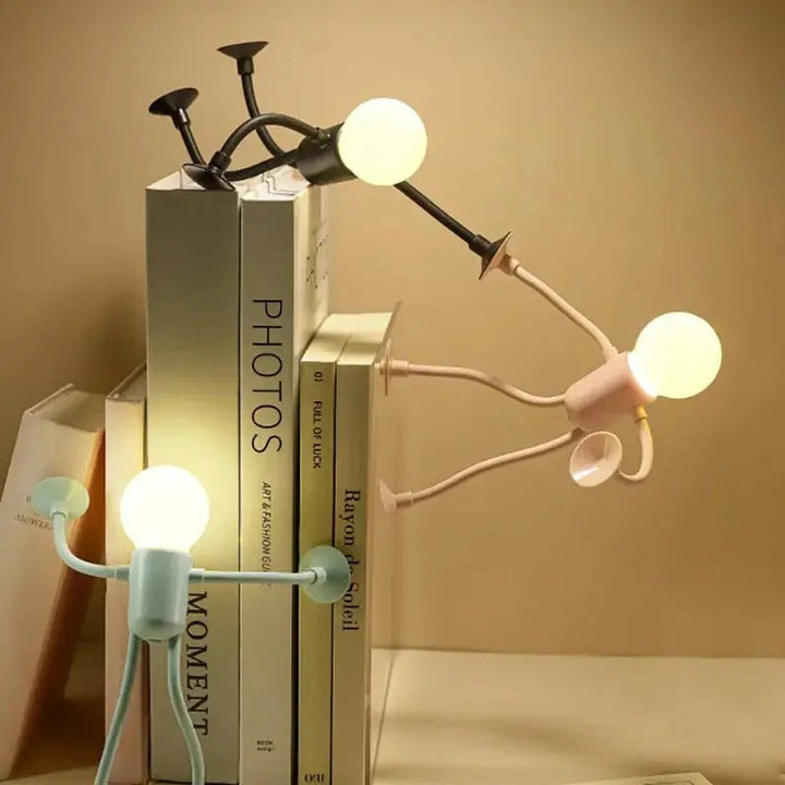 Lámpara de noche LED flexible figura humana, luz cálida para dormitorio y ambiente relajante.