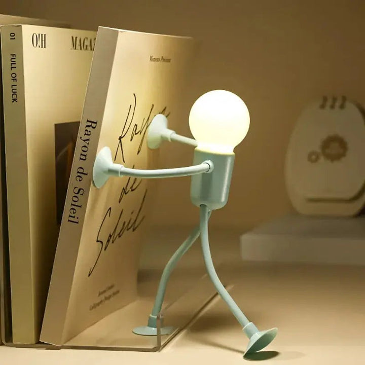 Lámpara de noche LED infantil, figura humana flexible con luz cálida ideal para la habitación de niños.