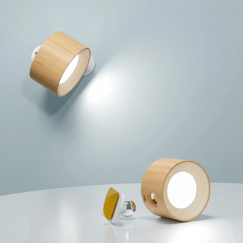 Lámpara de pared giratoria para iluminación interior moderna, luz direccional y recargable.
