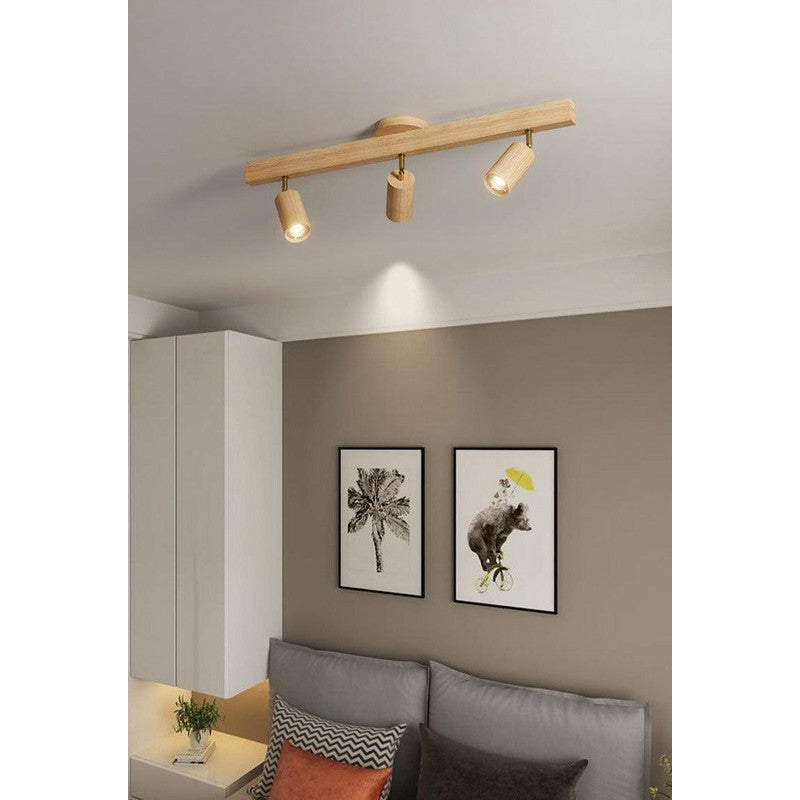 Lámpara de techo de madera, estilo minimalista. Detalle de focos LED en blanco.