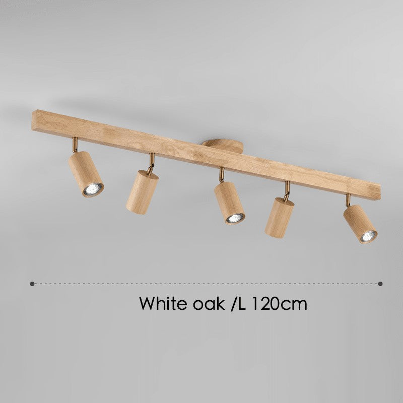 Primer plano de lámpara de techo minimalista de madera con focos LED para interior.