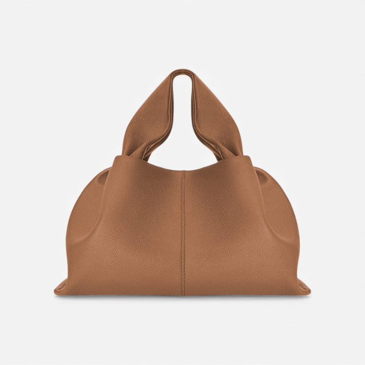 Bolso de hombro Lina para mujer, diseño compacto y elegante. Incluye correa ajustable para llevar como bandolera.