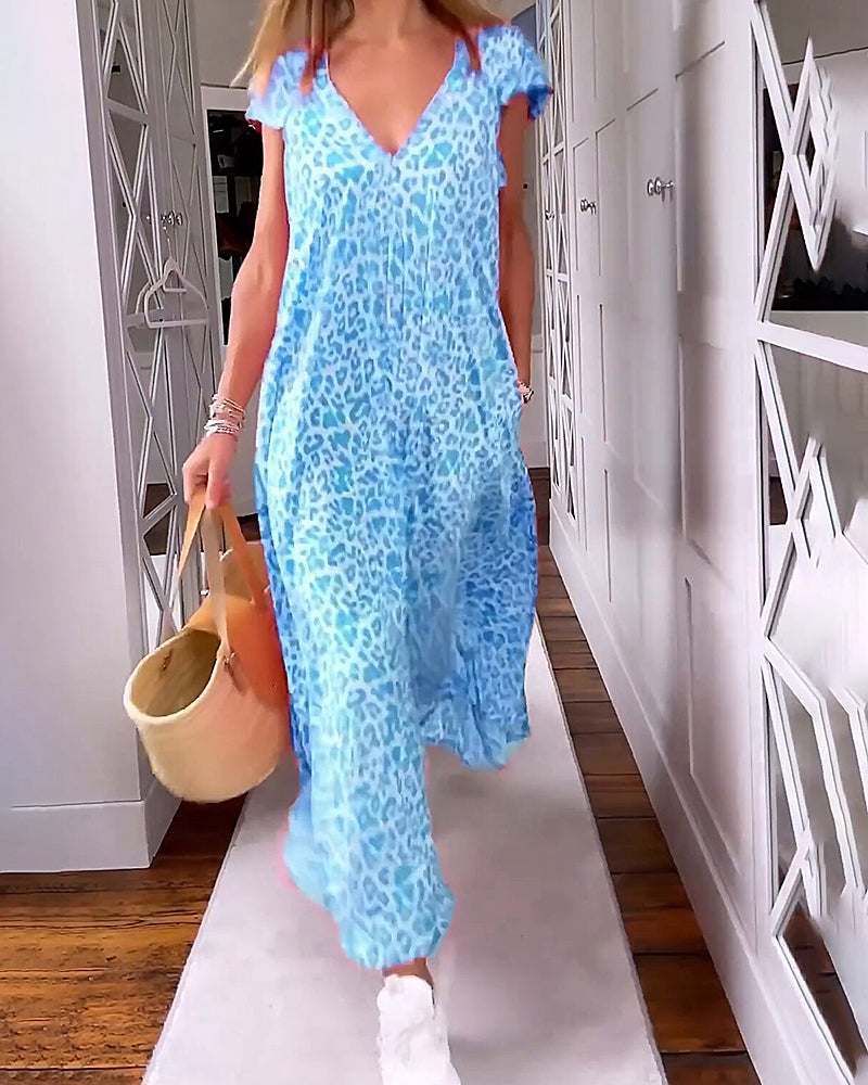 Vestido de mujer para verano, estampado floral alegre y cómodo escote V. Ropa fresca y ligera.