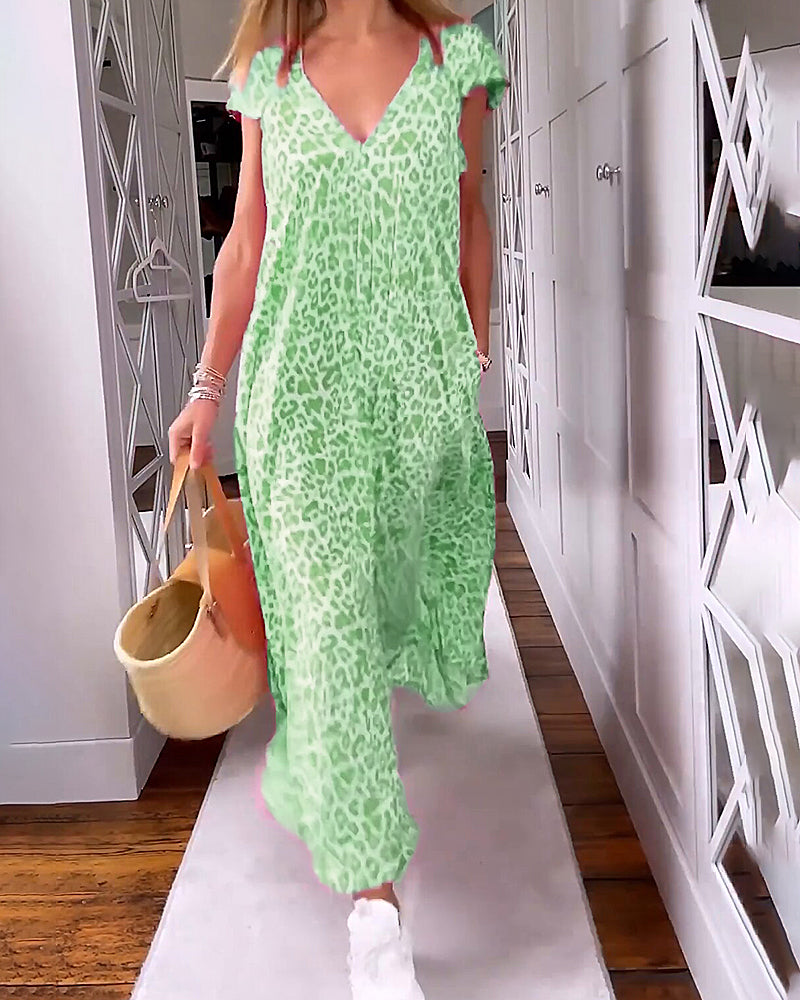 Vestido bohemio de verano para mujer, estampado alegre, escote V. Ideal para playa, fresco y ligero.