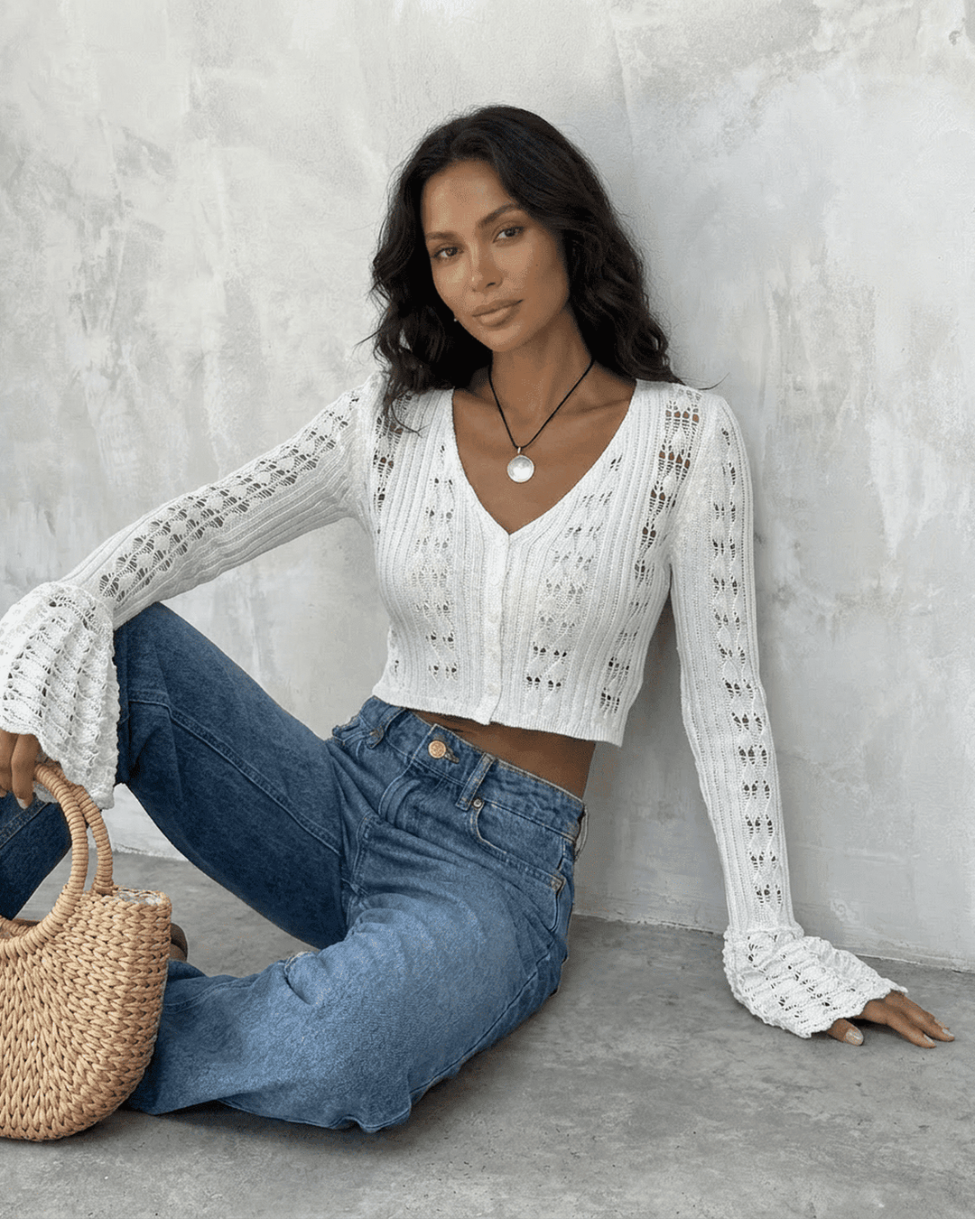 Cárdigan de mujer, ideal para un look moderno y sofisticado con sus mangas acampanadas.