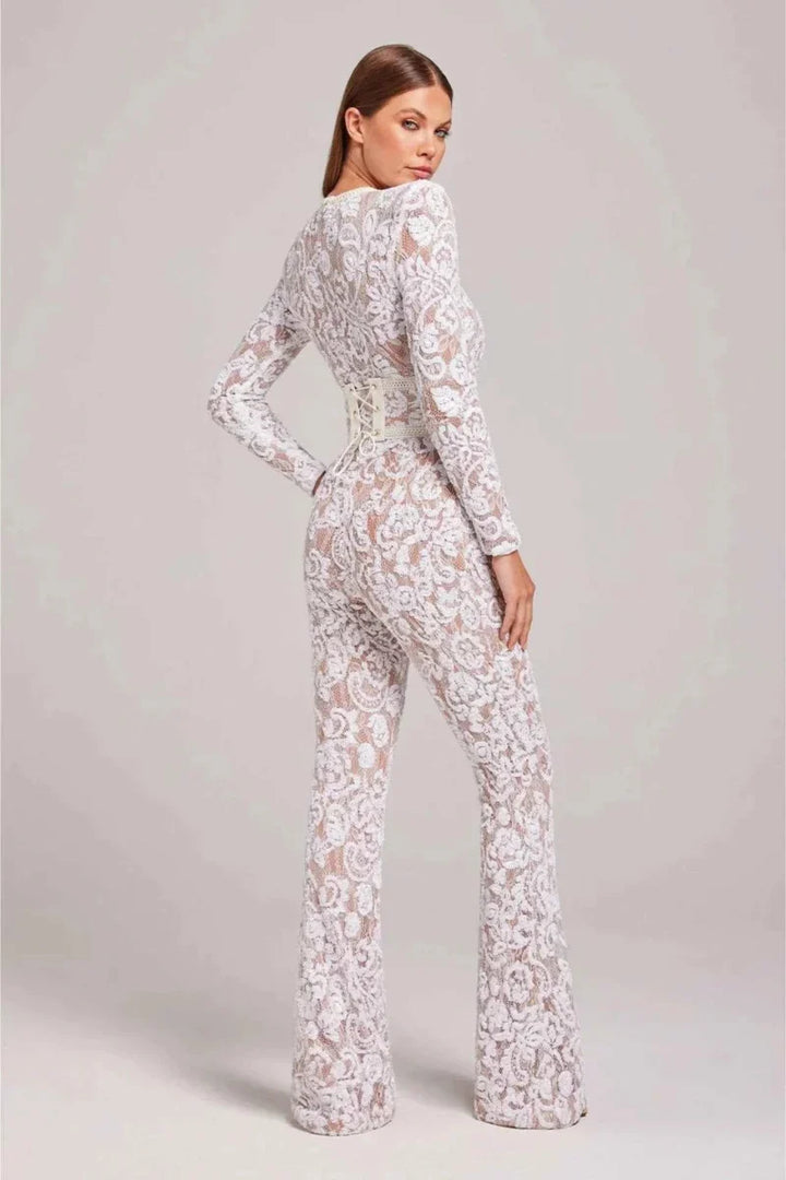 Mono sofisticado de encaje con manga larga y pierna ancha para mujer, ideal para noche, fiesta y glamour.