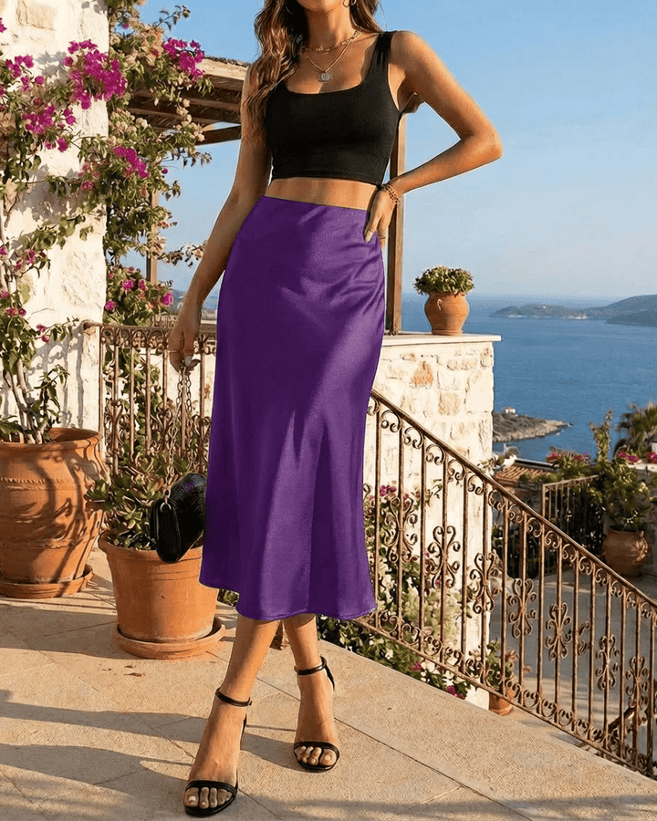Falda midi elegante para mujer, color púrpura vibrante, diseño sirena para cualquier ocasión.
