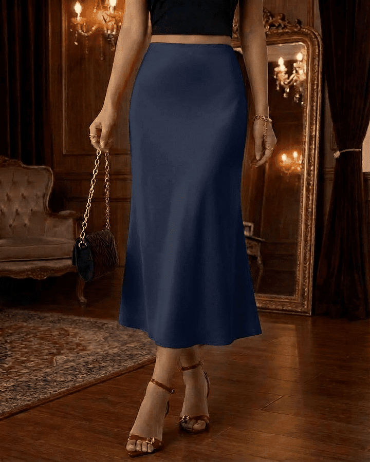 Falda midi azul marino elegante mujer, corte sirena, cintura alta. Moda versátil para eventos.