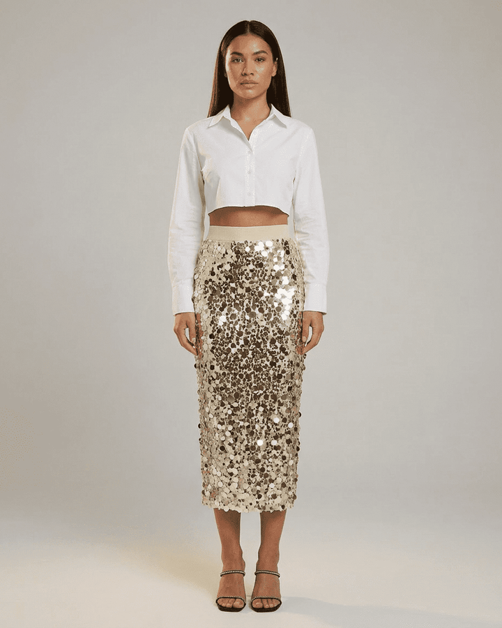 Falda midi blanca de lentejuelas bodycon con cintura alta para mujer. Diseño elegante y ajustado, perfecto para noche.