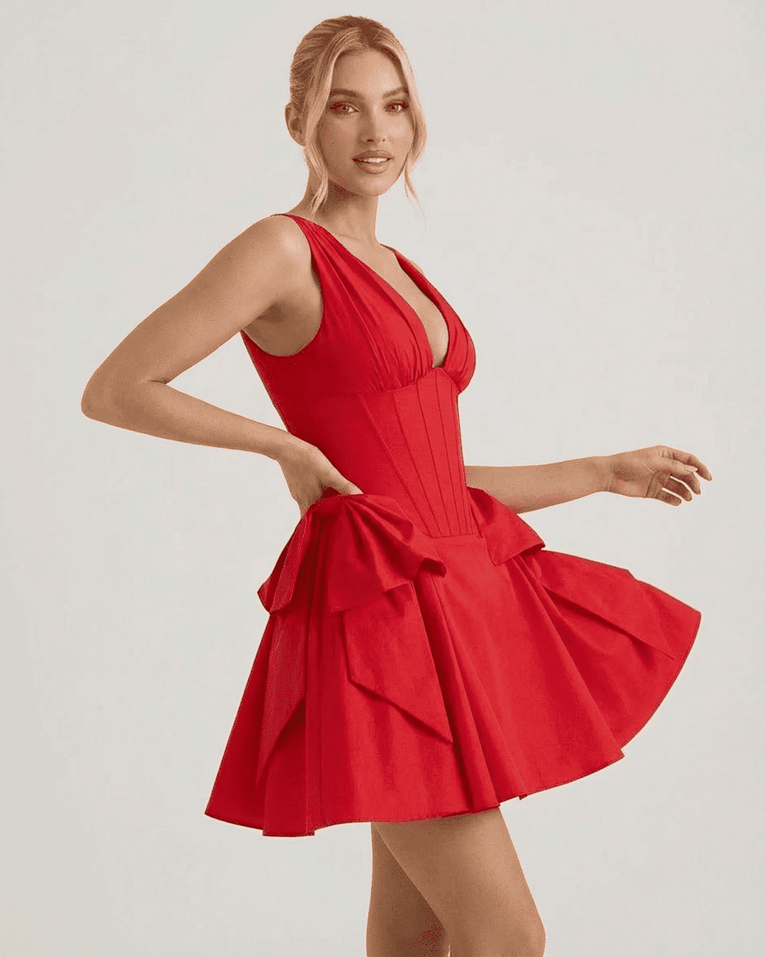 Moderno vestido de fiesta rojo, mini con corsé ajustado y falda abullonada. Glamour y elegancia para la noche.