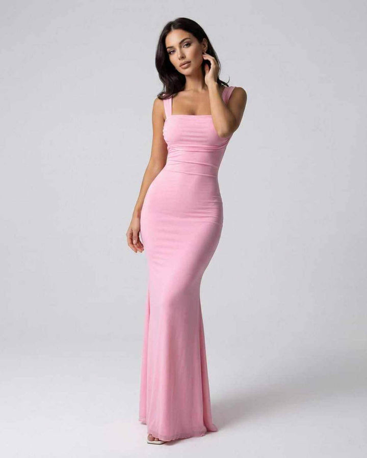 Vestido maxi rosa suave para mujer, elegante, con tirantes finos, ideal para fiestas y eventos nocturnos.