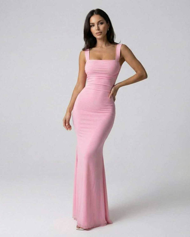 Vestido largo rosa suave para mujer, estilo sin mangas y tirantes finos, perfecto para fiestas y eventos elegantes.