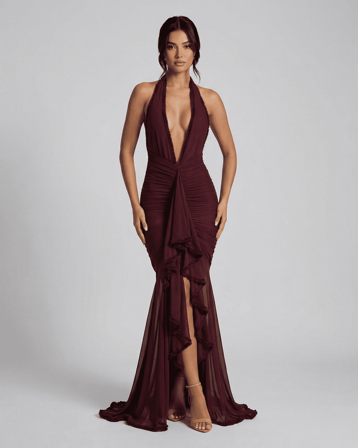 Vestido maxi burdeos elegante para mujer. Ideal para noches de fiesta y eventos especiales. Moda sofisticada.