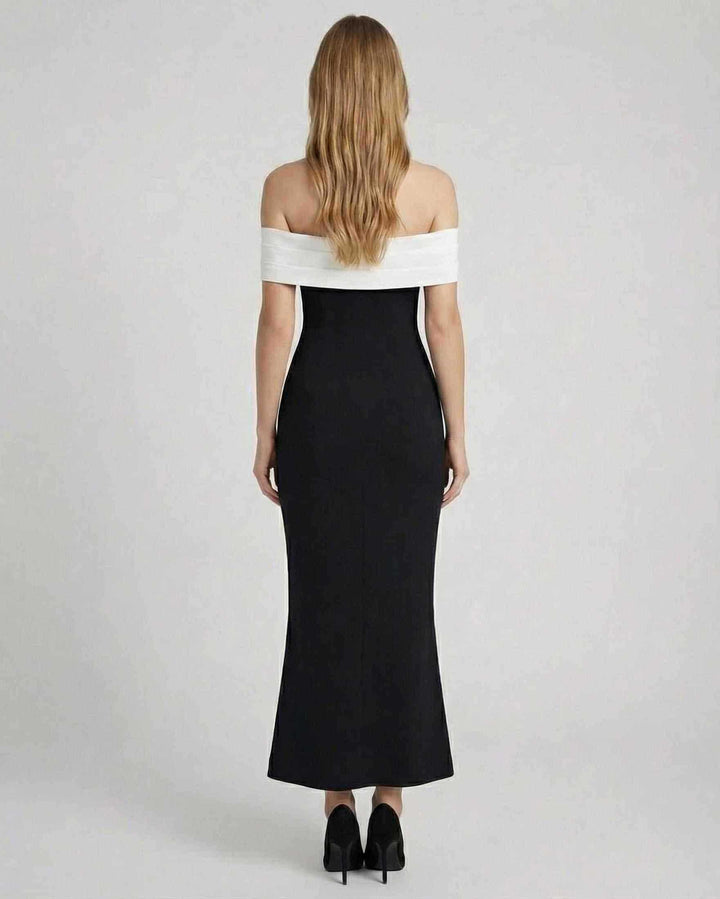 Elegante vestido maxi celeste para mujer con hombros descubiertos. Ideal para eventos formales, cenas y celebraciones.