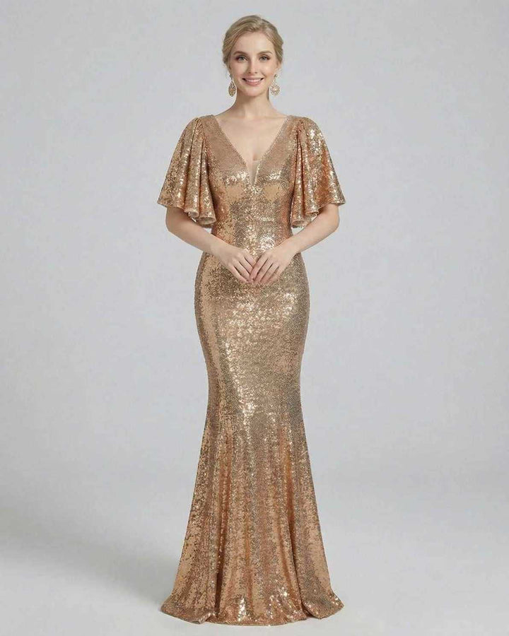 Glamuroso vestido maxi celeste, con brillo y mangas cortas. Elegancia radiante para eventos formales y fiestas.