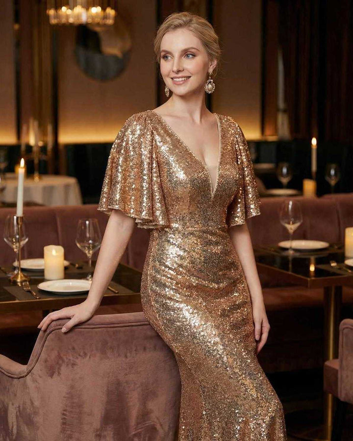 Vestido de noche celeste para mujer, silueta trompeta. Elegancia y brillo para gala. Escote V y mangas cortas.
