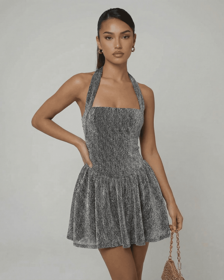 Vestido de fiesta con lentejuelas para mujer, un diseño mini elegante y brillante, ideal para cocteles y eventos nocturnos.
