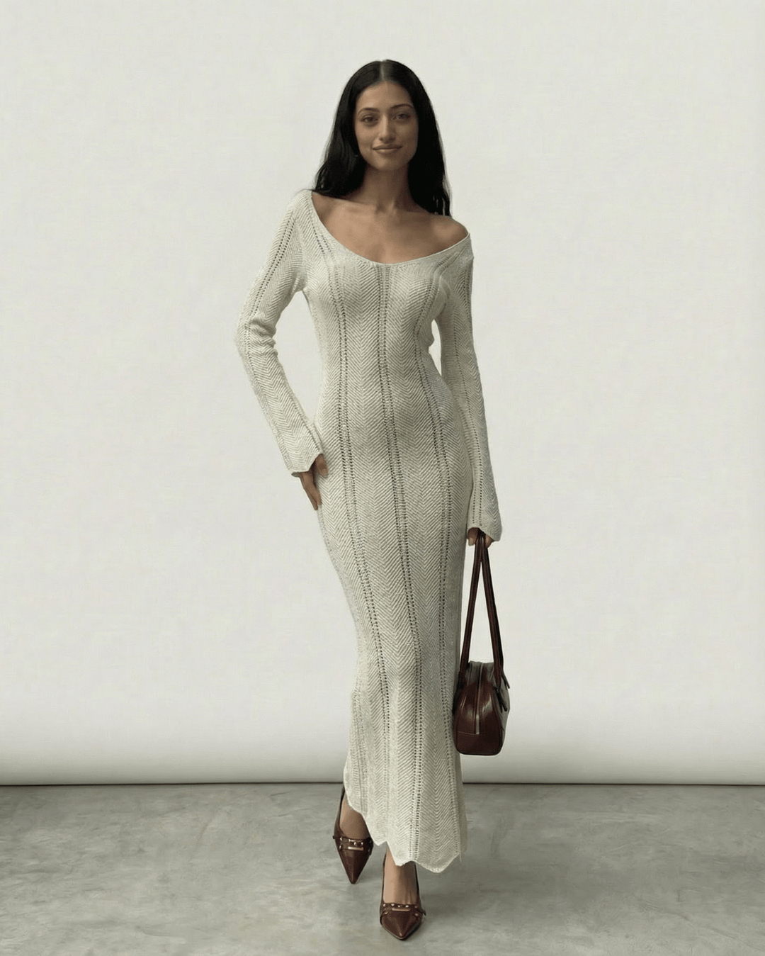 Vestido maxi Elara acanalado para mujer con mangas acampanadas. Estilo elegante y largo, perfecto para moda femenina.