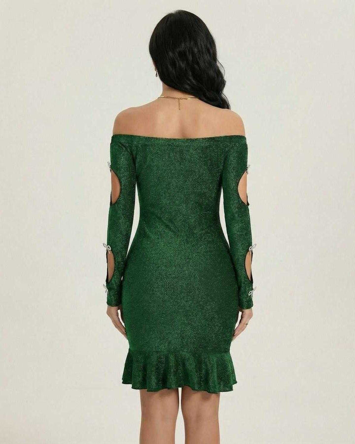 Vestido mini esmeralda ceñido para mujer, ideal para fiesta o cocktail, estilo elegante y moderno.