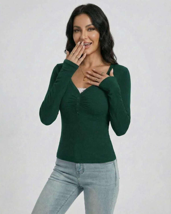 Suéter esmeralda de mujer, cuello V. Pullover elegante y versátil, ajuste slim fit para atuendos de invierno.