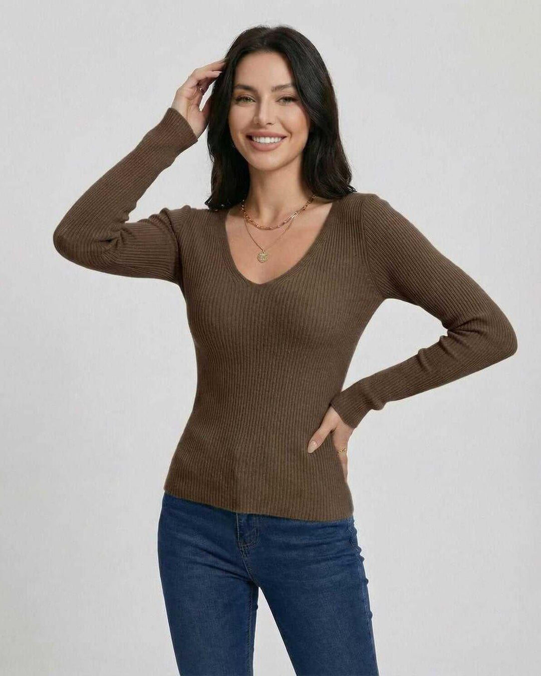 Suéter de mujer cuello V ajustado, manga larga. Pullover versátil para outfits elegantes de oficina o casuales.