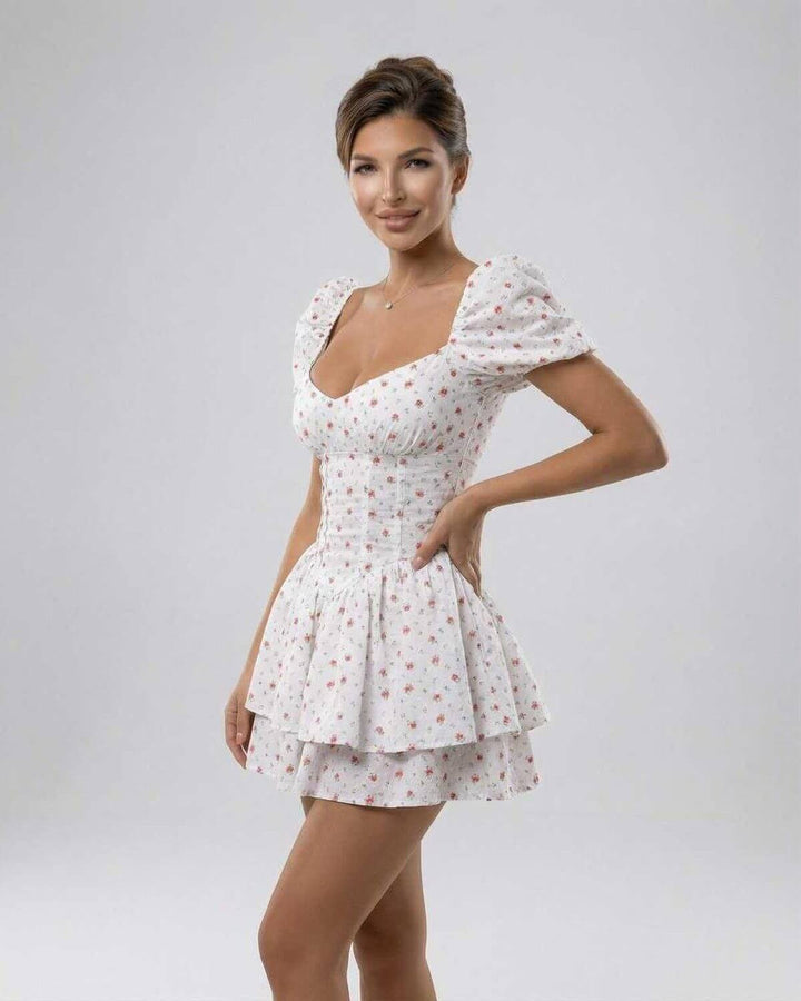 Vestido mini floral para mujer con escote V y mangas abullonadas. Perfecto para fiesta de jardín o brunch.