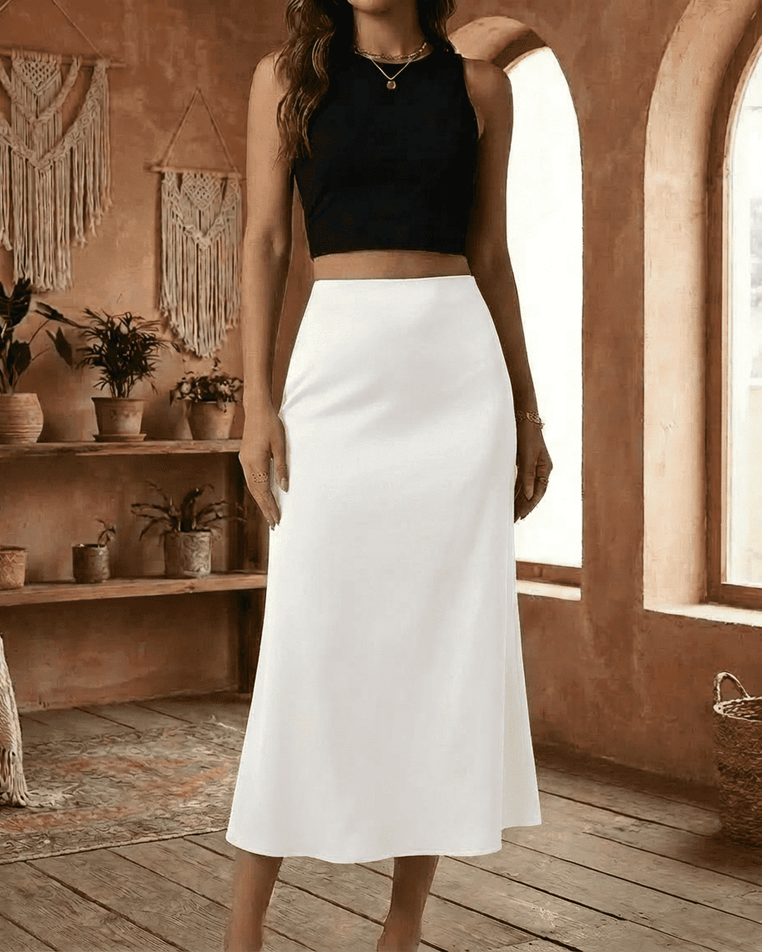 Atuendo elegante: falda midi de sirena blanca para mujer, de cintura alta y corte fluido. Ideal para moda formal.