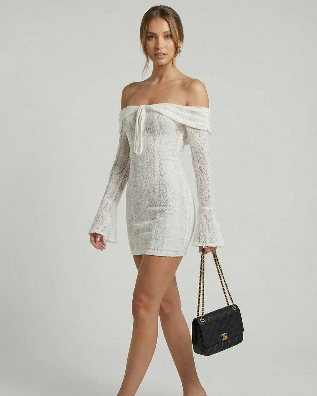 Vestido elegante blanco off-shoulder para mujer, diseño mini ideal para noches de fiesta y eventos chic.