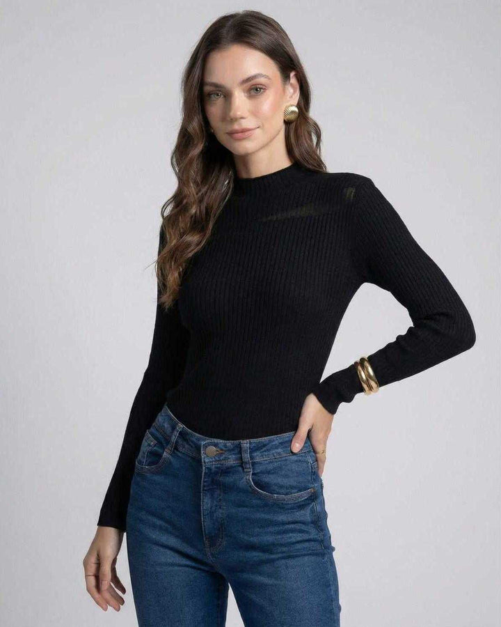 Elegante suéter pullover Milano para mujer, manga larga y tejido acanalado, ideal para moda de otoño e invierno.
