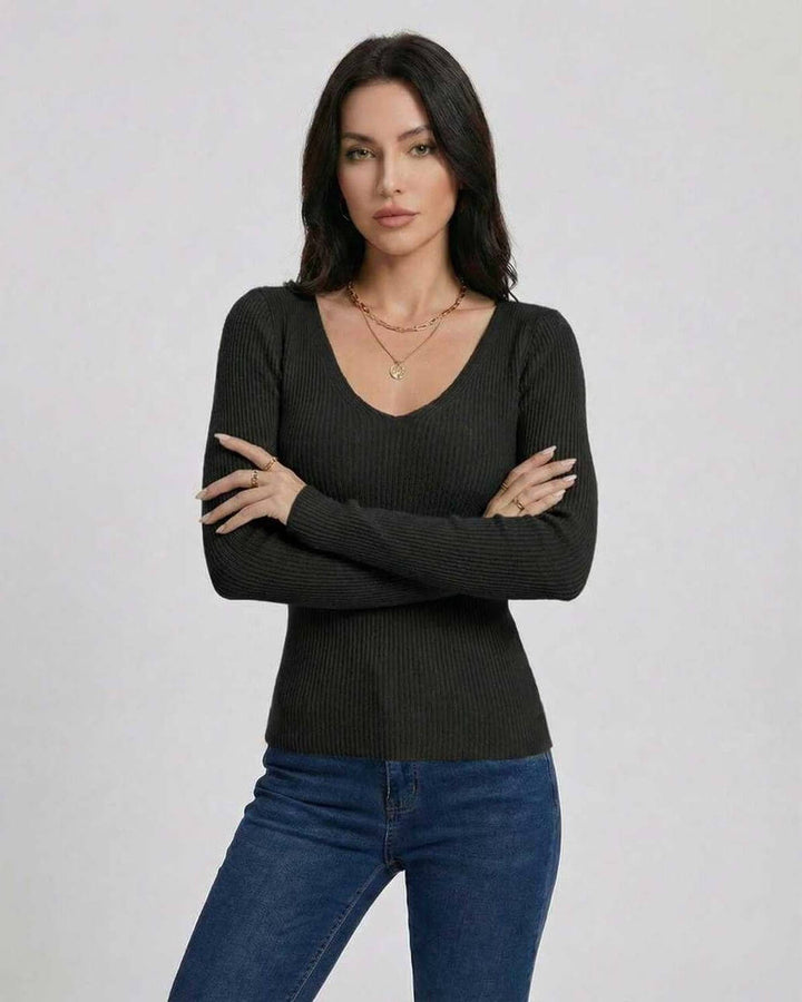 Suéter de moda para mujer, cuello V, manga larga. Ajuste slim que realza la figura. Ideal para capas.