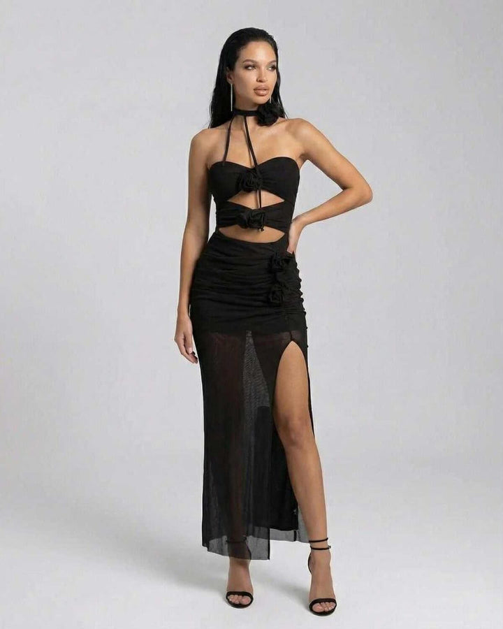 Vestido maxi halter de noche para mujer en negro, con escote elegante y silueta ajustada. Ideal para cóctel y eventos formales.