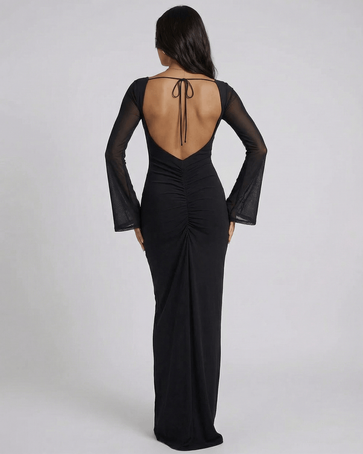 Vestido formal maxi de mujer en blanco, con mangas largas transparentes, perfecto para coctel y eventos.