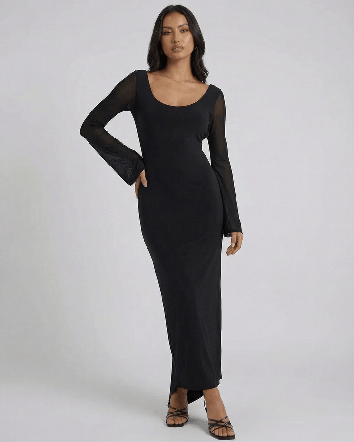 Vestido maxi blanco elegante para mujer, con mangas transparentes, ideal para fiesta o noche.