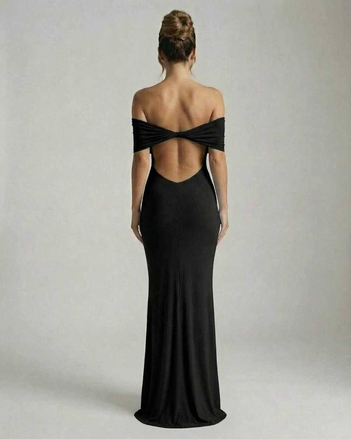 Vestido formal de noche negro sin espalda para mujer, un maxi vestido elegante y atemporal para celebraciones.