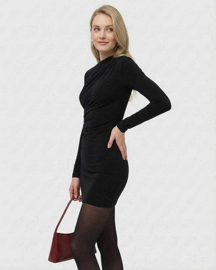Vestido bodycon negro de manga larga para mujer, con apliques y un ajuste mini elegante.