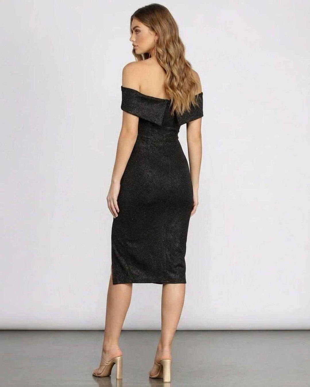 Vestido de fiesta midi negro con brillo, hombros descubiertos. Ideal para ocasiones especiales y noche.