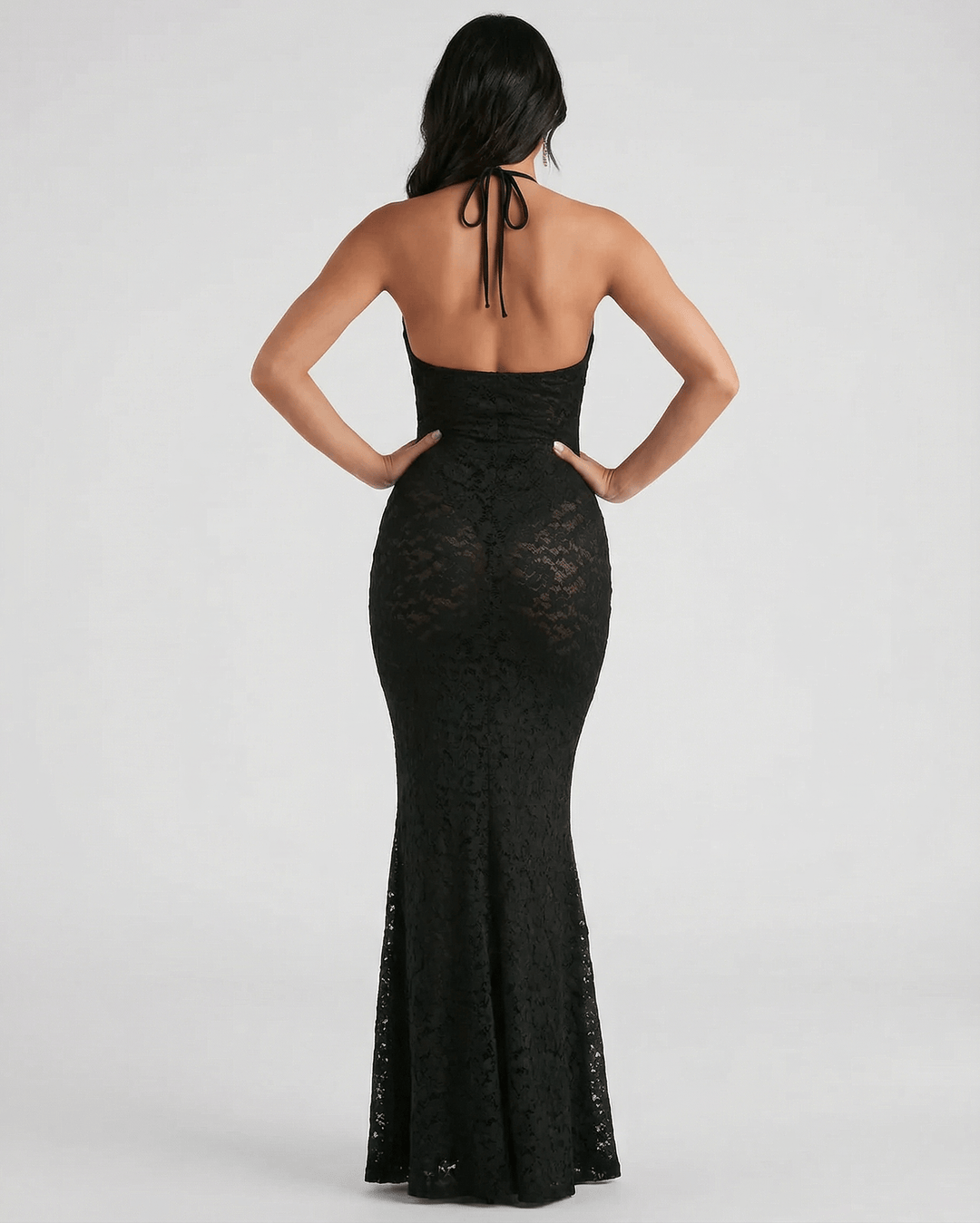 Vestido de fiesta largo sin mangas con escote V y silueta trompeta, ideal para ocasiones especiales.
