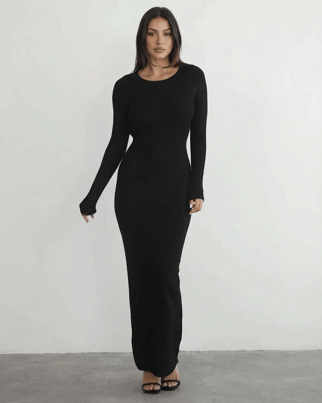 Vestido de noche negro con manga larga y espalda descubierta, moda elegante para mujer.
