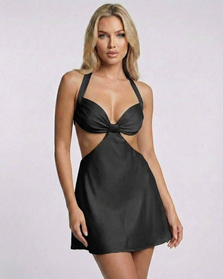 Vestido mini Onyx negro para mujer, escote halter, diseño cortado. Elegante y moderno para noche de fiesta.