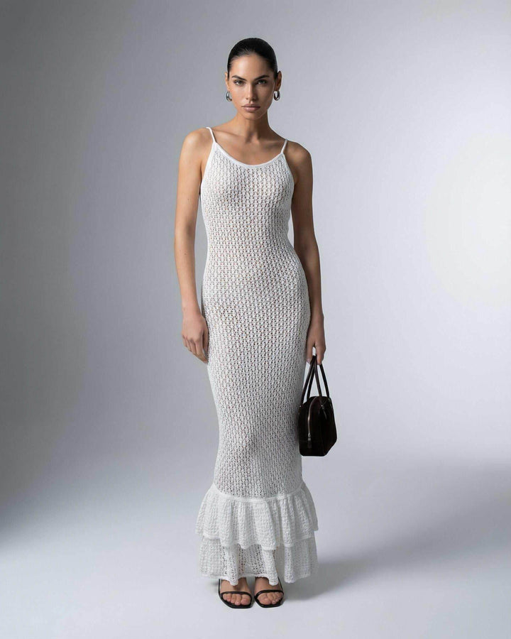 Vestido maxi blanco perla ajustado con corte hueco. Ideal moda mujer elegante y veraniega.