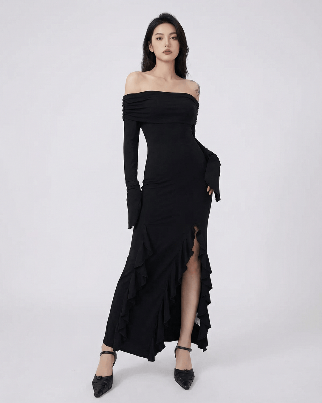 Vestido maxi negro asimétrico para mujer, ideal para noche, formal o cóctel.