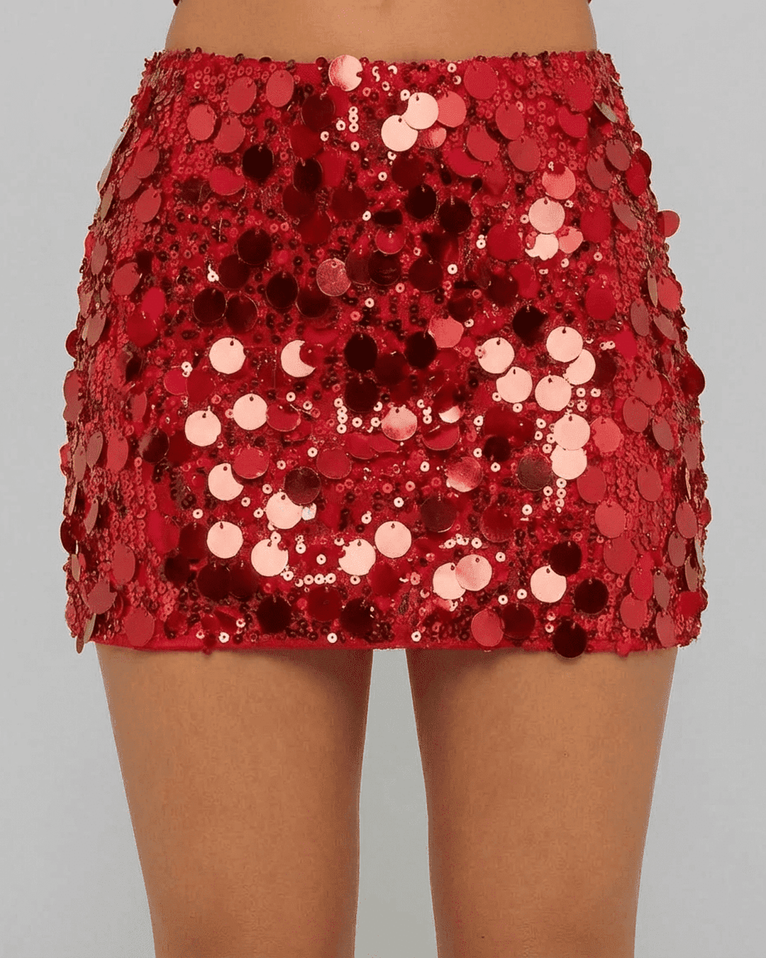 Mini falda roja de lentejuelas para mujer, brillante y chic. Perfecta para fiestas.