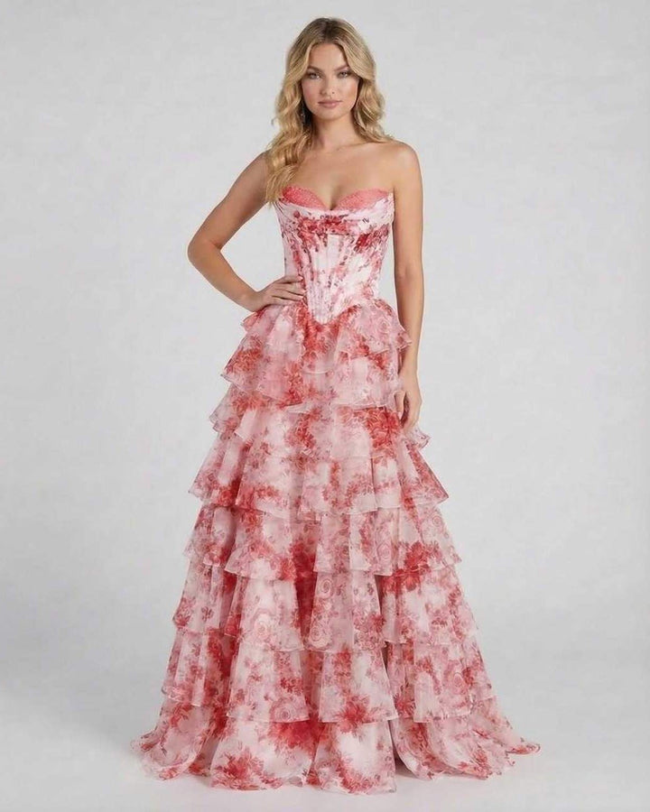 Vestido largo floral con volantes y silueta fluida. Estilo romántico y elegante para mujer.