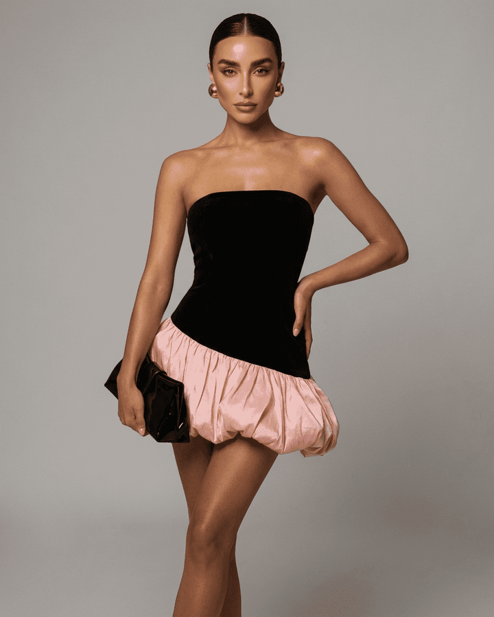 Vestido mini Selina negro elegante con falda abullonada. Ideal para noche, fiesta y coctel de mujer.