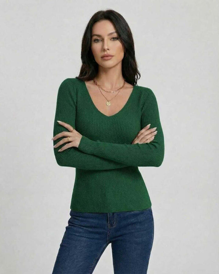 Pullover de mujer versátil, cuello V, ajuste ceñido, para atuendos casuales o de oficina.