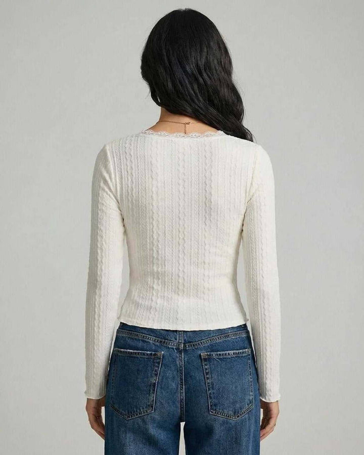 Pulóver Sienna ajustado para mujer, escote V con encaje delicado. Estilo casual chic, ideal para el frío.