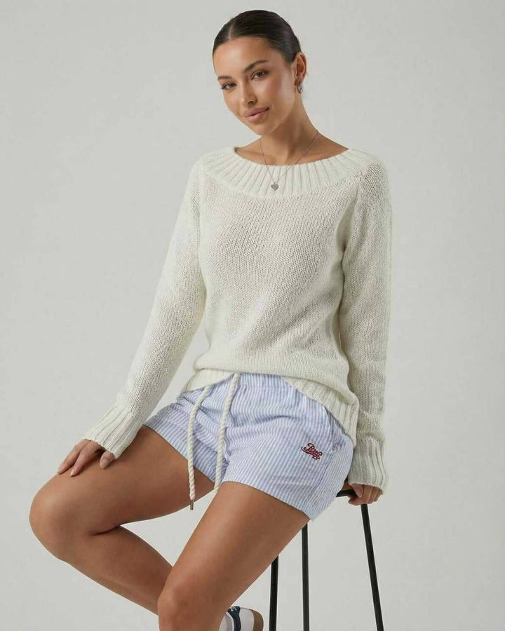 Elegante suéter de mujer cuello barco y manga larga. Ideal para moda otoño/invierno, estilo relajado y cómodo.