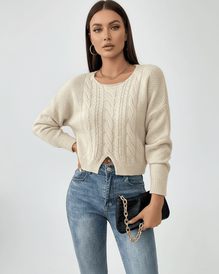 Suéter chic de punto trenzado blanco para mujer con manga larga y cuello redondo. Perfecto para looks casuales y elegantes.