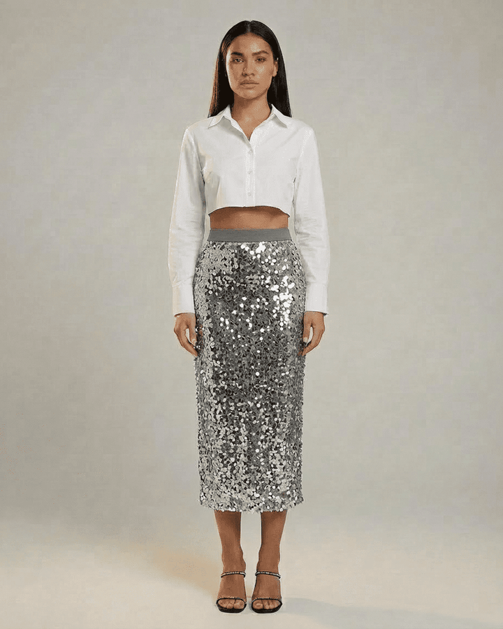 Falda midi gris brillante de mujer, estilo bodycon. Perfecta para eventos de noche o fiesta elegante.
