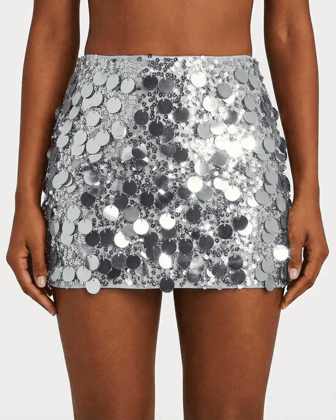 Mini falda ajustada de lentejuelas plateadas para mujer, ideal para fiesta, estilo noche glamuroso.